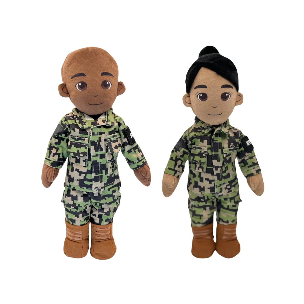 Two dolls in camouflage outfits on a white background