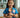Child holding a Medical Hero Doll in scrubs with recording feature, promoting comfort and connection for kids with healthcare parents.
